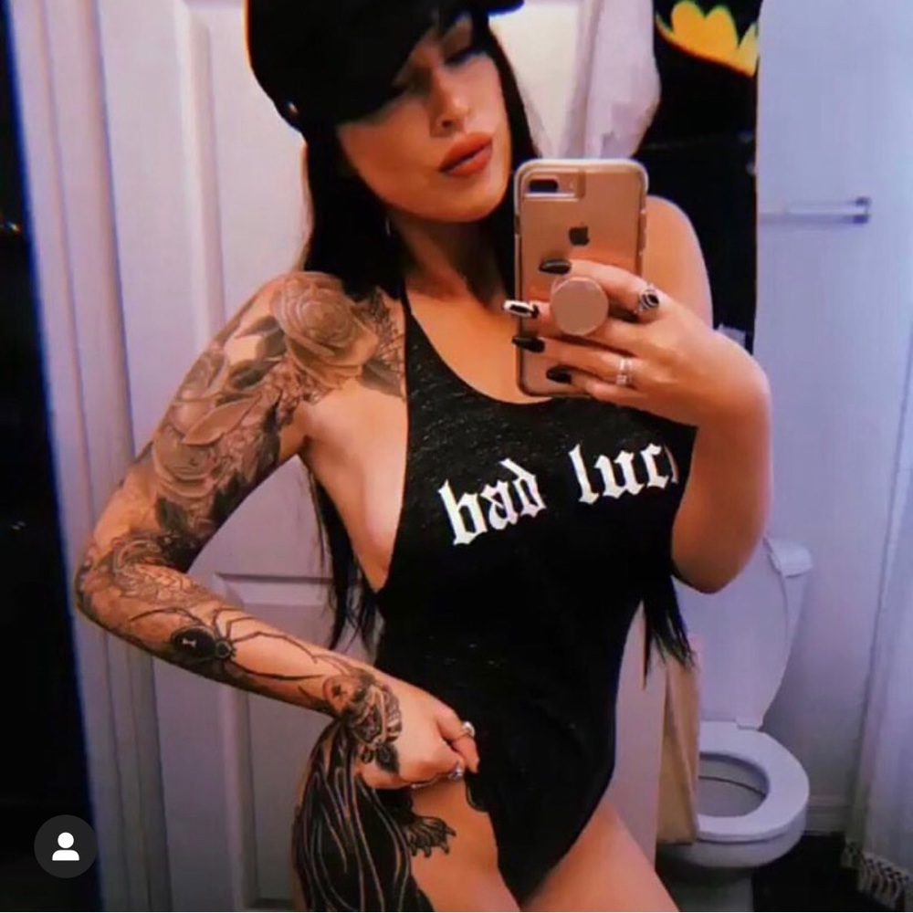 “BAD LUCK” body suit